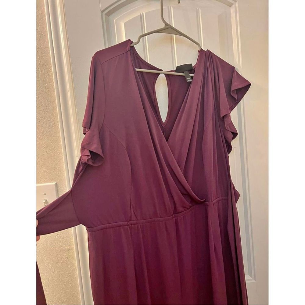 Lane Bryant plum colored jumpsuit. 
Size 18/20
Pockets and sash
Lightweight